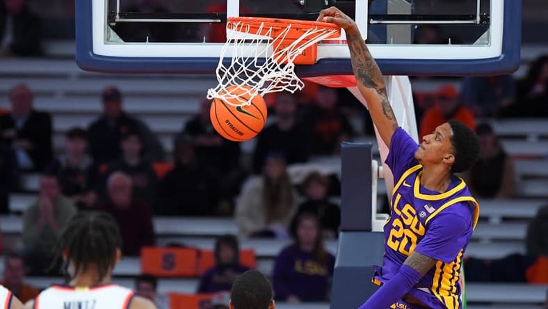 Nov 28, 2023; Syracuse, New York, USA; LSU Tigers forward Derek Fountain (20) dunks the ball against the Syracuse Orange during the second half at the JMA Wireless Dome. Mandatory Credit: Rich Barnes-USA TODAY Sports