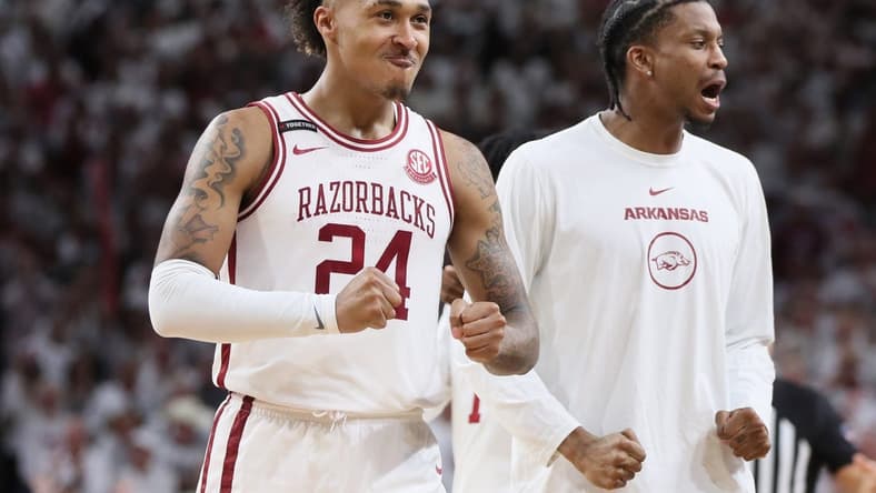 Nov 29, 2023; Fayetteville, Arkansas, USA; Arkansas Razorbacks guard Jeremiah Davenport (24) celebrates after a score in the second half against the Duke Blue Devils at Bud Walton Arena. Arkansas won 80-75. Mandatory Credit: Nelson Chenault-USA TODAY Sports