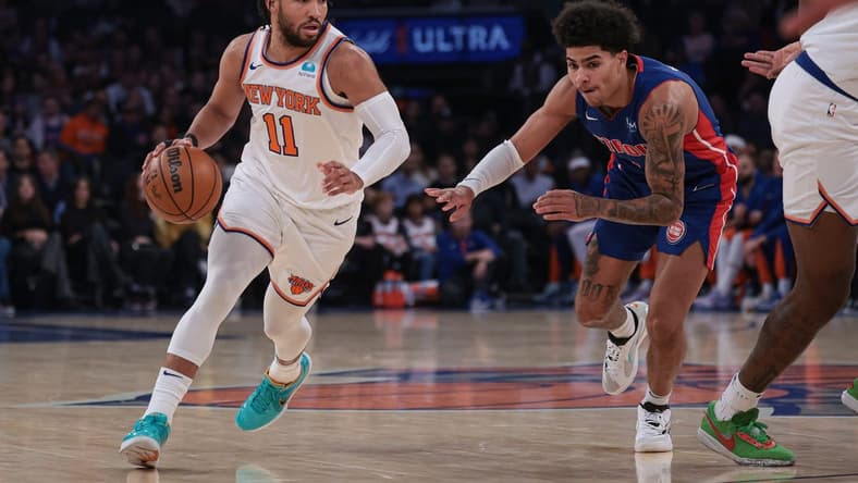 Nov 30, 2023; New York, New York, USA; New York Knicks guard Jalen Brunson (11) dribbles as Detroit Pistons guard Killian Hayes (7) defends during the first half at Madison Square Garden. Mandatory Credit: Vincent Carchietta-USA TODAY Sports