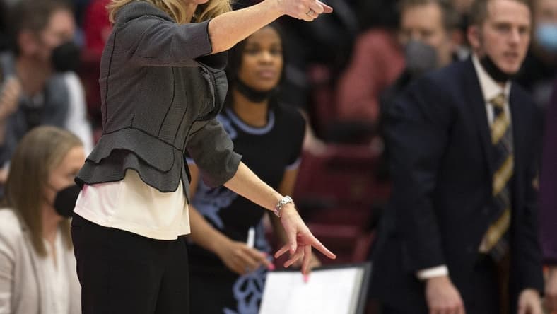 Feb 26, 2022; Stanford, California, USA; Washington Huskies head coach Tina Langley calls in a play to her team during the fourth quarter against the Stanford Cardinal at Maples Pavilion. Mandatory Credit: D. Ross Cameron-USA TODAY Sports