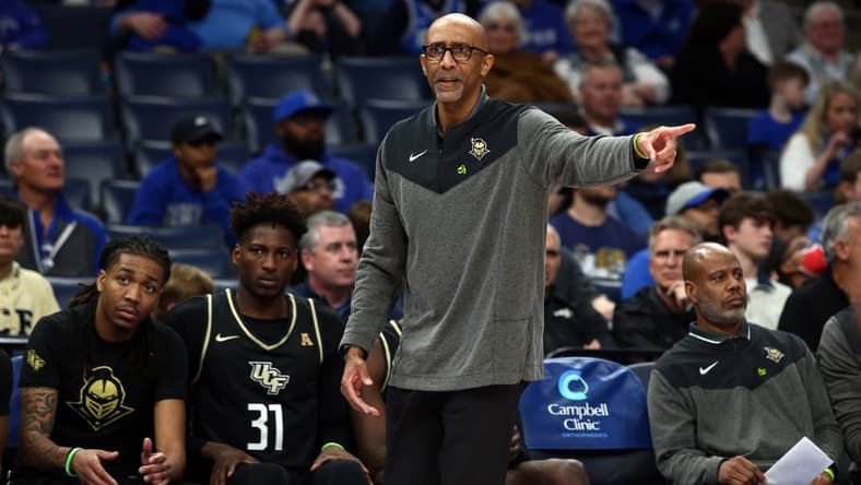 Feb 16, 2023; Memphis, Tennessee, USA; UCF Knights head coach Johnny Dawkins reacts during the first half against the Memphis Tigers at FedExForum. Mandatory Credit: Petre Thomas-USA TODAY Sports