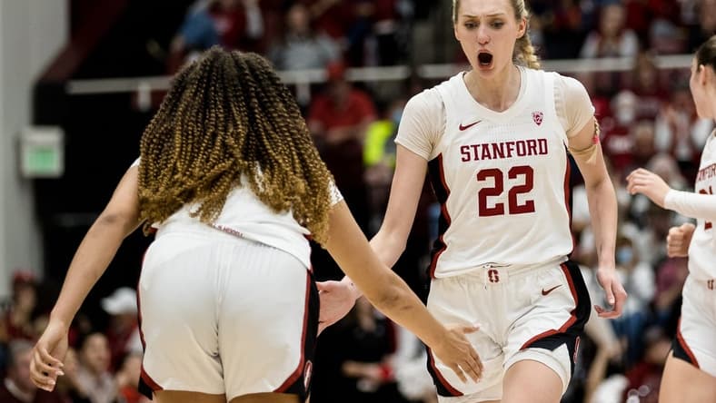 Feb 20, 2023; Stanford, California, USA; Stanford Cardinal forward Cameron Brink (22) is congratulated by guard Haley Jones (30) after scoring against the UCLA Bruins during the second half at Maples Pavilion. Mandatory Credit: John Hefti-USA TODAY Sports