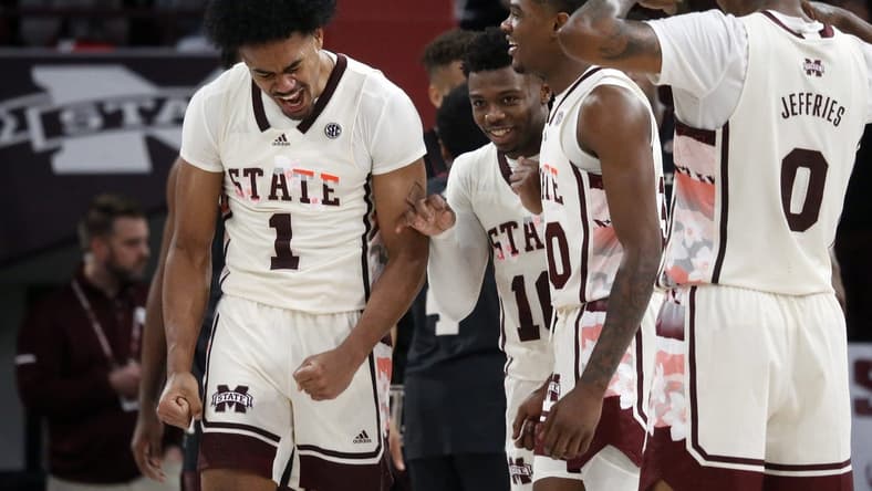 Feb 25, 2023; Starkville, Mississippi, USA; Mississippi State Bulldogs forward Tolu Smith (1) reacts with teammates after a basket during the second half against the Texas A&M Aggies at Humphrey Coliseum. Mandatory Credit: Petre Thomas-USA TODAY Sports
