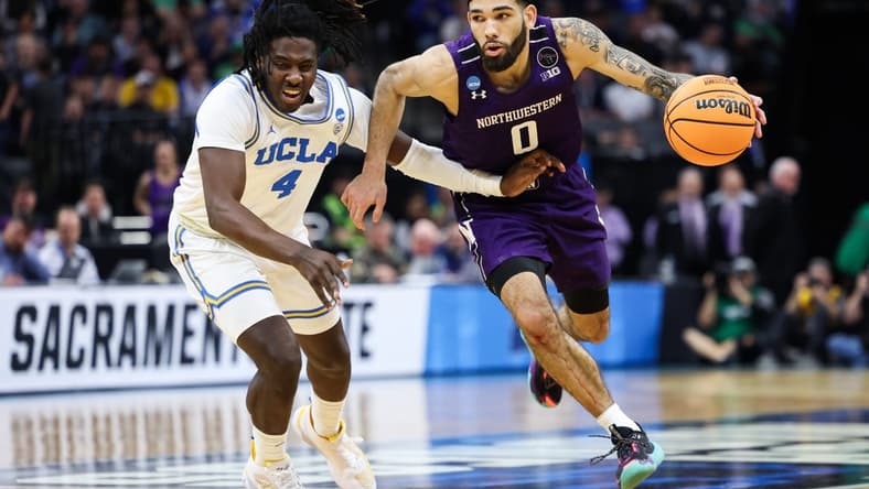 Mar 18, 2023; Sacramento, CA, USA; Northwestern Wildcats guard Boo Buie (0) drives to the basket while defended by UCLA Bruins guard Will McClendon (4) during the second half at Golden 1 Center. Mandatory Credit: Kelley L Cox-USA TODAY Sports