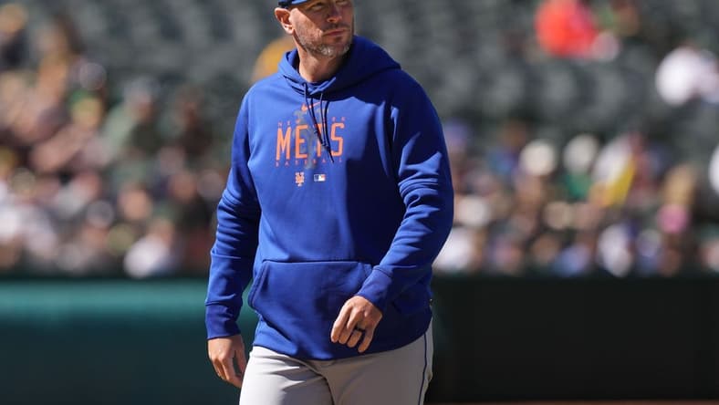 Apr 16, 2023; Oakland, California, USA; New York Mets pitching coach Jeremy Hefner walks to the dugout during the eighth inning against the Oakland Athletics at RingCentral Coliseum. Mandatory Credit: Darren Yamashita-USA TODAY Sports