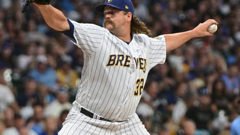 Aug 5, 2023; Milwaukee, Wisconsin, USA; Milwaukee Brewers pitcher Andrew Chafin (32) pitches against the Pittsburgh Pirates in the eighth inning at American Family Field. Mandatory Credit: Benny Sieu-USA TODAY Sports