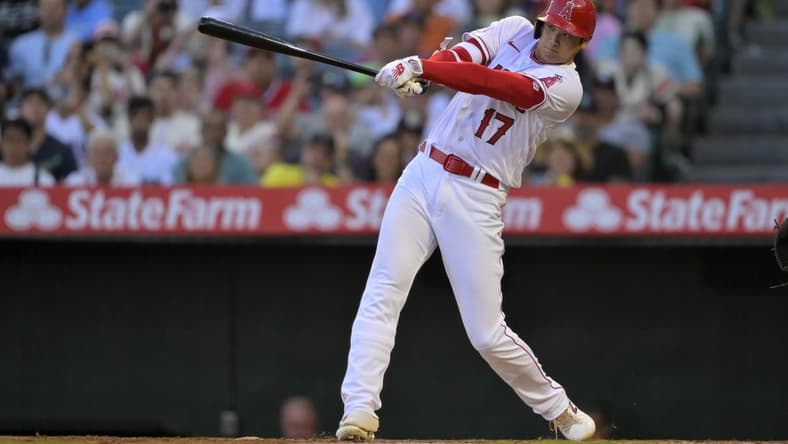 Aug 5, 2023; Anaheim, California, USA; Los Angeles Angels designated hitter Shohei Ohtani (17) lines out to right field in the fourth inning against the Seattle Mariners at Angel Stadium. Mandatory Credit: Jayne Kamin-Oncea-USA TODAY Sports