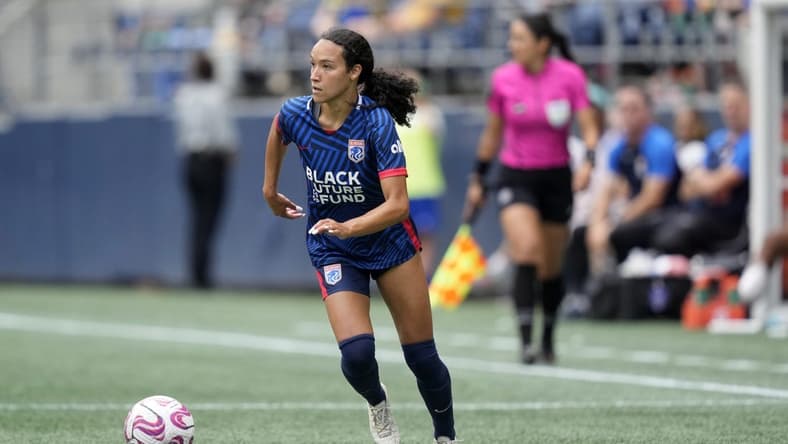 Aug 6, 2023; Seattle, WA, USA; OL Reign defender Alyssa Malonson (20) controls the ball during the second half against Portland Thorns FC at Lumen Field. Mandatory Credit: Stephen Brashear-USA TODAY Sports