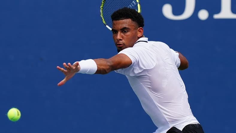 Aug 29, 2023; Flushing, NY, USA;  Arthur Fils of France hits a shot against Tallon Griekspoor of Netherlands on day two of the 2023 U.S. Open tennis tournament at the USTA Billie Jean King National Tennis Center. Mandatory Credit: Jerry Lai-USA TODAY Sports