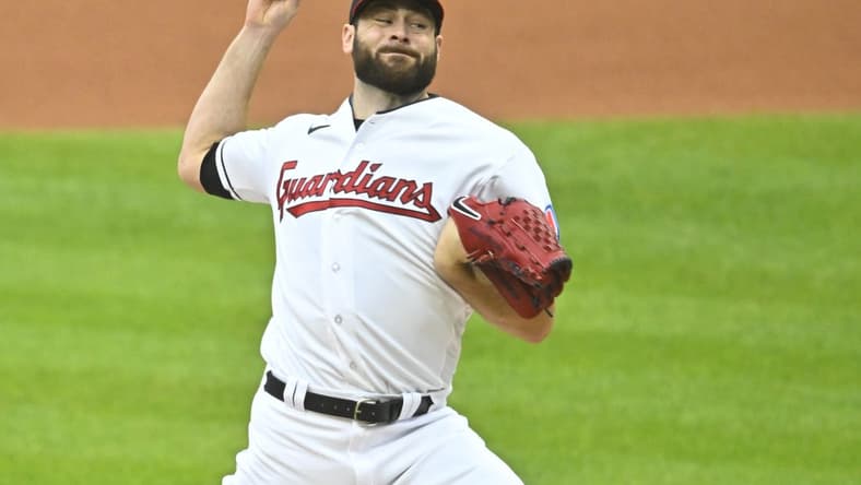 Sep 26, 2023; Cleveland, Ohio, USA; Cleveland Guardians starting pitcher Lucas Giolito (27) delivers a pitch in the first inning against the Cincinnati Reds at Progressive Field. Mandatory Credit: David Richard-USA TODAY Sports
