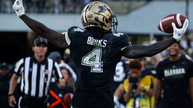 Purdue Boilermakers wide receiver Deion Burks (4) reacts after making a catch during the NCAA football game against the Illinois Fighting Illini, Saturday, Sept. 30, 2023, at Ross-Ade Stadium in West Lafayette, Ind. Purdue Boilermakers won 44-19.