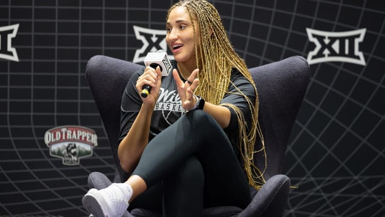 Oct 17, Kansas City, MO, USA; Kansas State player Ayoka Lee answers questions at the Big 12 Women s Basketball Tipoff at T-Mobile Center. Mandatory Credit: Kylie Graham-USA TODAY Sports
