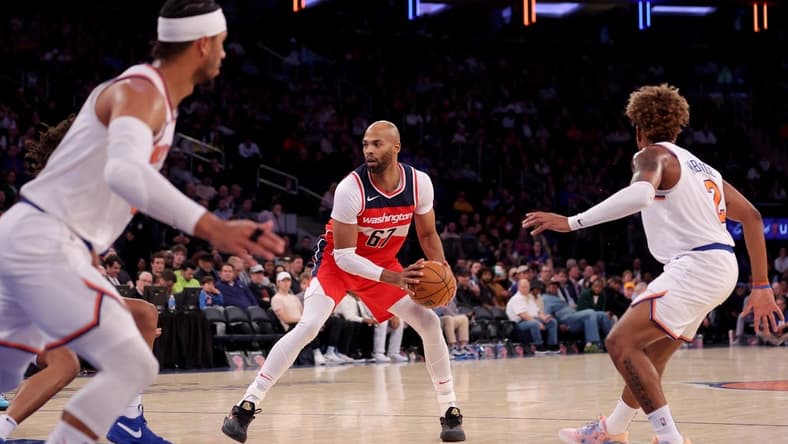 Oct 18, 2023; New York, New York, USA; Washington Wizards forward Taj Gibson (67) controls the ball against the New York Knicks during the fourth quarter at Madison Square Garden. Mandatory Credit: Brad Penner-USA TODAY Sports