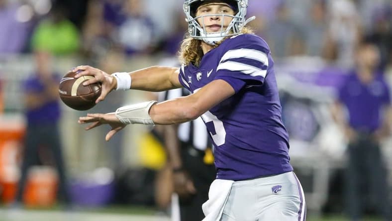 Oct 21, 2023; Manhattan, Kansas, USA; Kansas State Wildcats quarterback Avery Johnson (5) drops back to pass during the first quarter against the TCU Horned Frogs at Bill Snyder Family Football Stadium. Mandatory Credit: Scott Sewell-USA TODAY Sports
