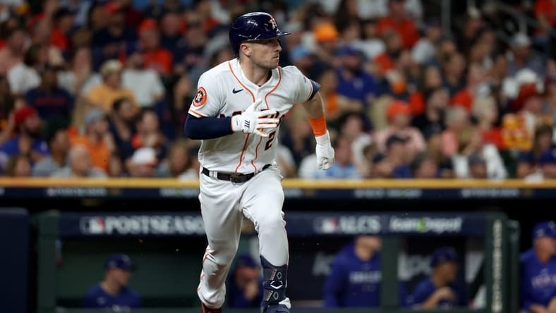 Oct 23, 2023; Houston, Texas, USA; Houston Astros third baseman Alex Bregman (2) doubles during the seventh inning of game seven in the ALCS against the Texas Rangers for the 2023 MLB playoffs at Minute Maid Park. Mandatory Credit: Thomas Shea-USA TODAY Sports