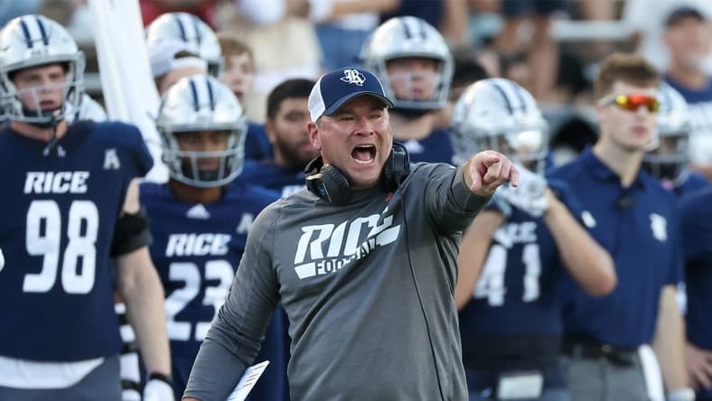 Oct 28, 2023; Houston, Texas, USA; Rice Owls head coach Mike Bloomgren argues about the time clock in the second half against the Tulane Green Wave at Rice Stadium. Mandatory Credit: Thomas Shea-USA TODAY Sports