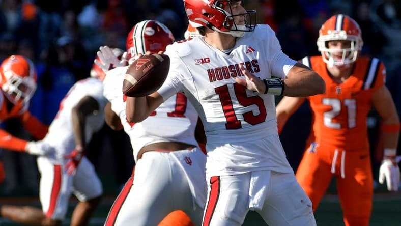 Nov 11, 2023; Champaign, Illinois, USA; Indiana Hoosiers quarterback Brendan Sorsby (15) passes the ball during the second half against the Illinois Fighting Illini at Memorial Stadium. Mandatory Credit: Ron Johnson-USA TODAY Sports