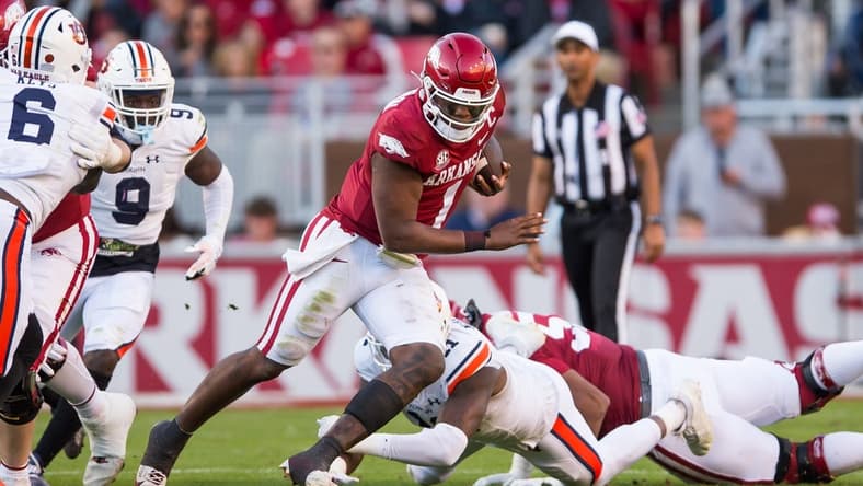 Nov 11, 2023; Fayetteville, Arkansas, USA; Arkansas Razorbacks quarterback KJ Jefferson (1) gets past Auburn Tigers linebacker Elijah McAllister (11) during the second quarter at Donald W. Reynolds Razorback Stadium. Mandatory Credit: Brett Rojo-USA TODAY Sports