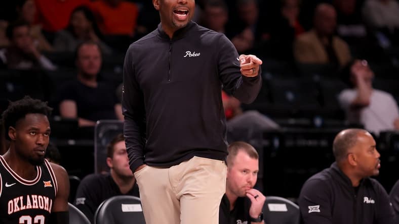 Nov 16, 2023; Brooklyn, New York, USA; Oklahoma State Cowboys head coach Mike Boynton coaches against the St. Bonaventure Bonnies during the first half at Barclays Center. Mandatory Credit: Brad Penner-USA TODAY Sports