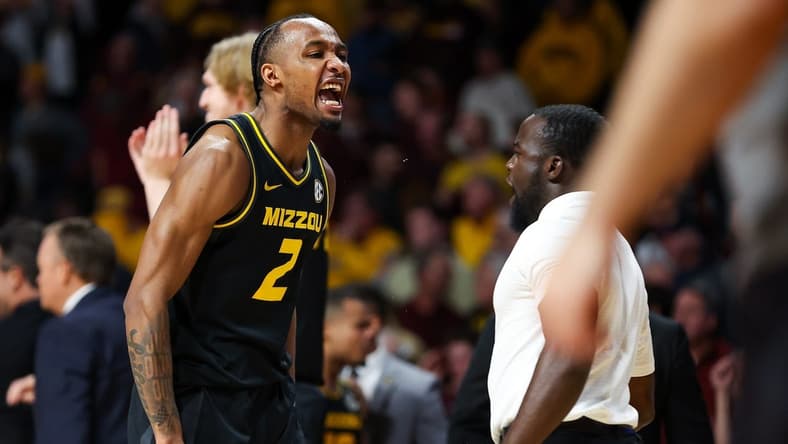Nov 16, 2023; Minneapolis, Minnesota, USA; Missouri Tigers guard Tamar Bates (2) celebrates the win against the Minnesota Golden Gophers at Williams Arena. Mandatory Credit: Matt Krohn-USA TODAY Sports