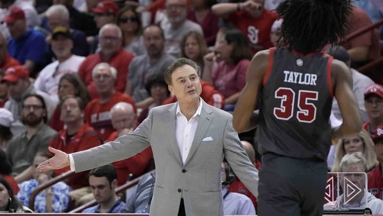 Nov 17, 2023; Charleston, SC, USA; St. John's Red Storm head coach Rick Pitino talks with St. John's Red Storm forward Glenn Taylor Jr. (35) in the first half at TD Arena. Mandatory Credit: David Yeazell-USA TODAY Sports