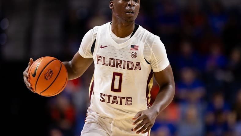 Nov 17, 2023; Gainesville, Florida, USA; Florida State Seminoles guard Chandler Jackson (0) dribbles the ball during the first half against the Florida Gators at Exactech Arena at the Stephen C. O'Connell Center. Mandatory Credit: Matt Pendleton-USA TODAY Sports