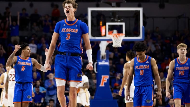 Nov 17, 2023; Gainesville, Florida, USA; Florida Gators center Micah Handlogten (3) celebrates during a timeout during the first half against the Florida State Seminoles at Exactech Arena at the Stephen C. O'Connell Center. Mandatory Credit: Matt Pendleton-USA TODAY Sports
