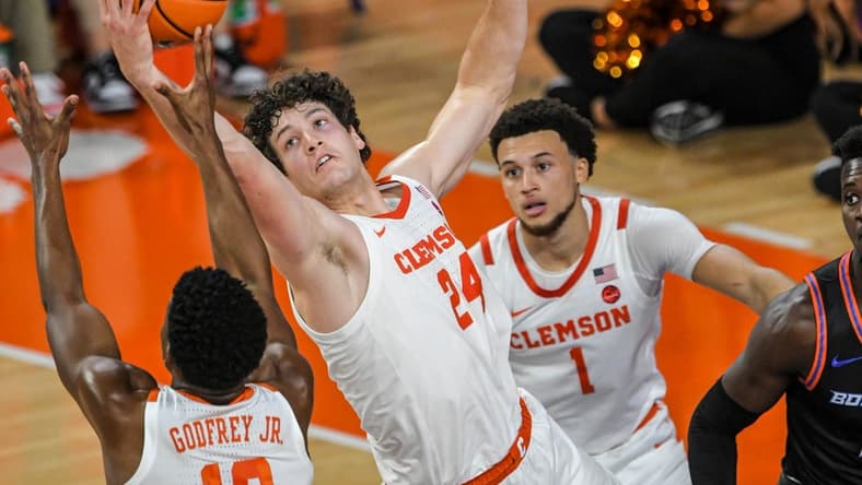 Sunday, November 19, 2023; Clemson junior forward PJ Hall (24) rebounds against Boise State during the first half at Littlejohn Coliseum in Clemson, S.C. Sunday, November 19, 2023. Mandatory Credit: Ken Ruinard-USA TODAY NETWORK