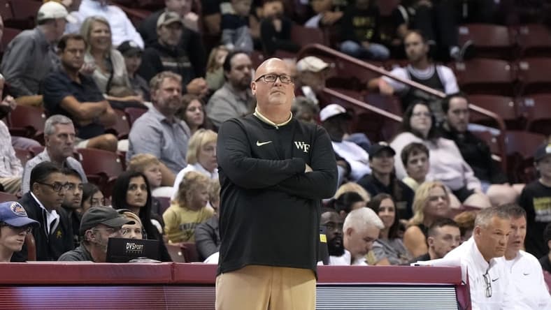 Nov 19, 2023; Charleston, SC, USA; Wake Forest Demon Deacons head coach Steve Forbes watches the action in the first half against the LSU Tigers at TD Arena. Mandatory Credit: David Yeazell-USA TODAY Sports