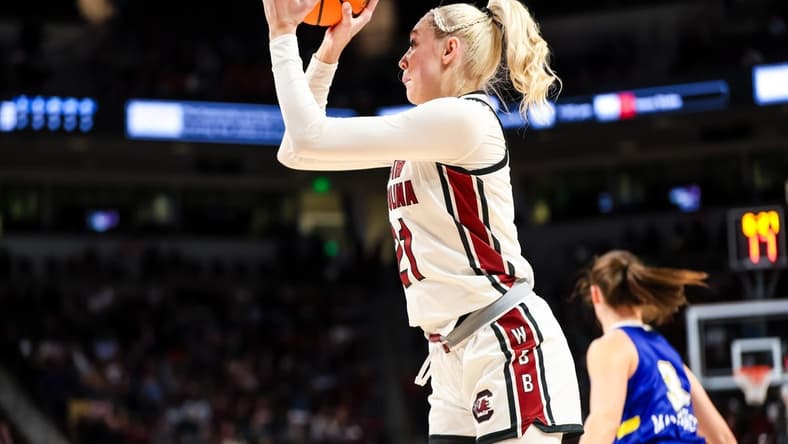 Nov 20, 2023; Columbia, South Carolina, USA; South Carolina Gamecocks forward Chloe Kitts (21) shoots against the South Dakota State Jackrabbits in the first half at Colonial Life Arena. Mandatory Credit: Jeff Blake-USA TODAY Sports