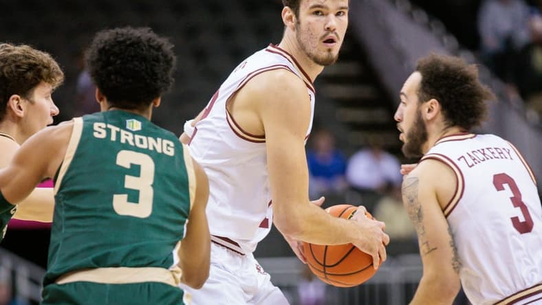 Nov 22, 2023; Kansas City, Missouri, USA; Boston College Eagles forward Quinten Post (12) looks to pass during the first half against the Colorado State Rams at T-Mobile Center. Mandatory Credit: William Purnell-USA TODAY Sports