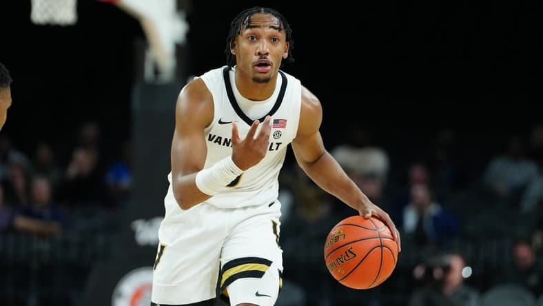 Nov 23, 2023; Las Vegas, Nevada, USA; Vanderbilt Commodores guard Tyrin Lawrence (0) dribbles against the North Carolina State Wolfpack during the first half at Michelob Ultra Arena. Mandatory Credit: Stephen R. Sylvanie-USA TODAY Sports