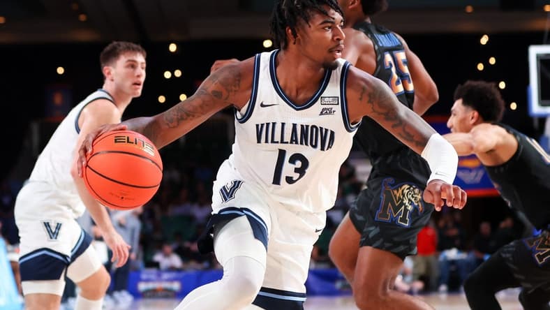 Nov 24, 2023; Paradise Island, BAHAMAS; Villanova Wildcats guard Hakim Hart (13) drives to the basket past Memphis Tigers guard Jayden Hardaway (25) during the first half at Imperial Arena. Mandatory Credit: Kevin Jairaj-USA TODAY Sports