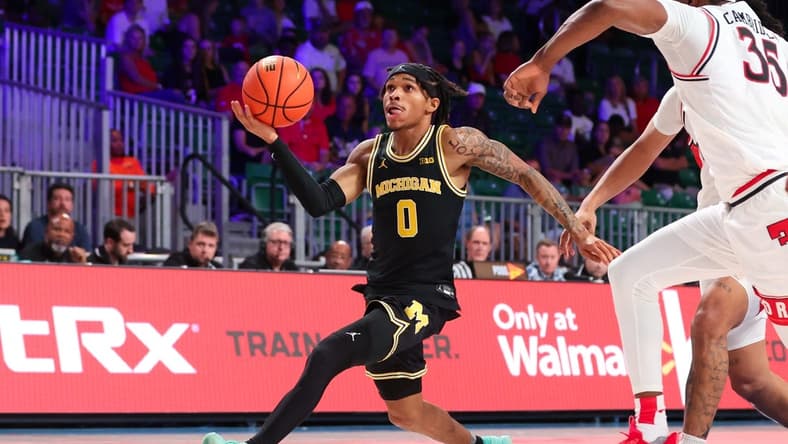 Nov 24, 2023; Paradise Island, BAHAMAS;  Michigan Wolverines guard Dug McDaniel (0) shoots during the second half against the Texas Tech Red Raiders at Imperial Arena. Mandatory Credit: Kevin Jairaj-USA TODAY Sports