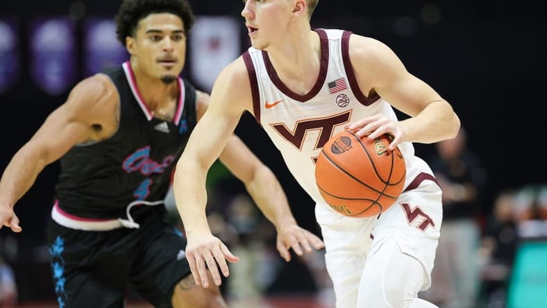 Nov 26, 2023; Kissimmee, FL, USA; Virginia Tech Hokies guard Sean Pedulla (3) drives to the hoop against the Florida Atlantic Owls in the first half during the ESPN Events Invitational Championship game at State Farm Field House. Mandatory Credit: Nathan Ray Seebeck-USA TODAY Sports