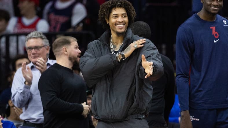 Nov 27, 2023; Philadelphia, Pennsylvania, USA; Philadelphia 76ers guard Kelly Oubre Jr. in street clothes reacts from the bench after a defensive stop against the Los Angeles Lakers during the third quarter at Wells Fargo Center. Mandatory Credit: Bill Streicher-USA TODAY Sports