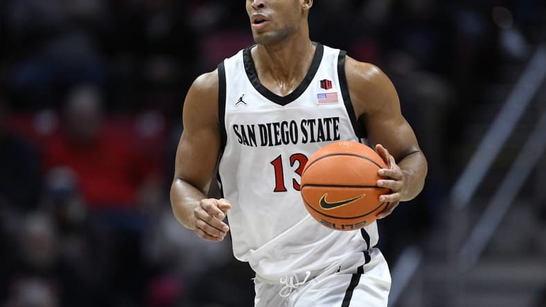 Nov 27, 2023; San Diego, California, USA; San Diego State Aztecs forward Jaedon LeDee (13) dribbles the ball during the first half against the Point Loma Nazarene Sea Lions at Viejas Arena. Mandatory Credit: Orlando Ramirez-USA TODAY Sports