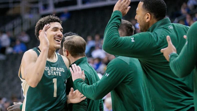 Nov 23, 2023; Kansas City, Missouri, USA; Colorado State Rams forward Joel Scott (1) celebrates with the bench during the game against the Creighton Bluejays at T-Mobile Center. Mandatory Credit: William Purnell-USA TODAY Sports