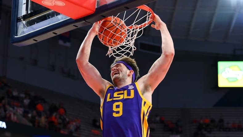 Nov 28, 2023; Syracuse, New York, USA; LSU Tigers forward Will Baker (9) dunks the ball against the Syracuse Orange during the first half at the JMA Wireless Dome. Mandatory Credit: Rich Barnes-USA TODAY Sports