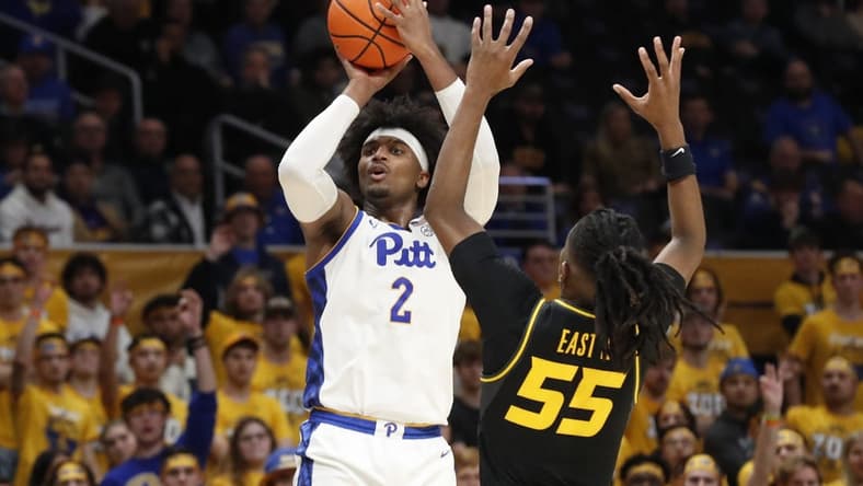 Nov 28, 2023; Pittsburgh, Pennsylvania, USA; Pittsburgh Panthers forward Blake Hinson (2) shoots a three point basket against Missouri Tigers guard Sean East II (55) during the second half at the Petersen Events Center. The Tigers won 71-64. Mandatory Credit: Charles LeClaire-USA TODAY Sports