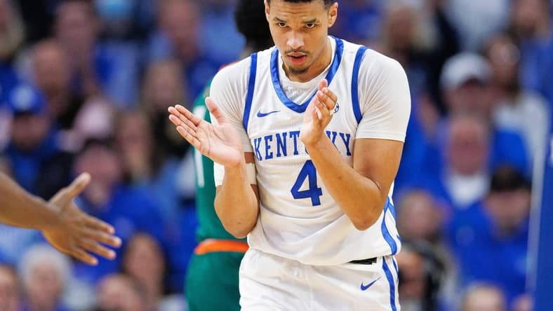 Nov 28, 2023; Lexington, Kentucky, USA; Kentucky Wildcats forward Tre Mitchell (4) reacts during the first half against the Miami (Fl) Hurricanes at Rupp Arena at Central Bank Center. Mandatory Credit: Jordan Prather-USA TODAY Sports
