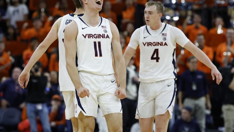 Nov 29, 2023; Charlottesville, Virginia, USA; Virginia Cavaliers guard Isaac McKneely (11) celebrates after the Cavaliers' game against the Texas A&M Aggies at John Paul Jones Arena. Mandatory Credit: Geoff Burke-USA TODAY Sports