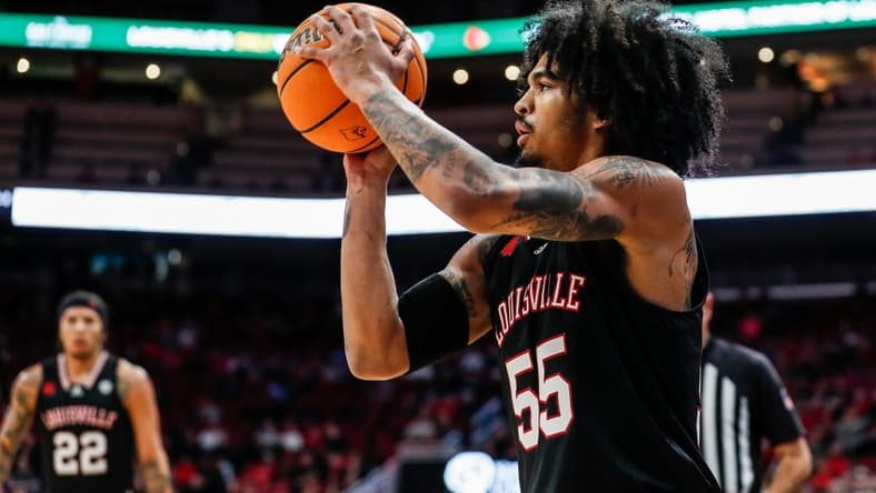 Louisville Cardinals guard Skyy Clark (55) takes a three-point shot against Bellarmine on Nov. 29, 2023