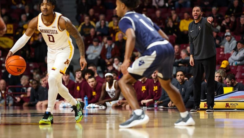 Nov 30, 2023; Minneapolis, Minnesota, USA; Minnesota Golden Gophers head coach Ben Johnson calls a play during the first half against the New Orleans Privateers at Williams Arena. Mandatory Credit: Matt Krohn-USA TODAY Sports