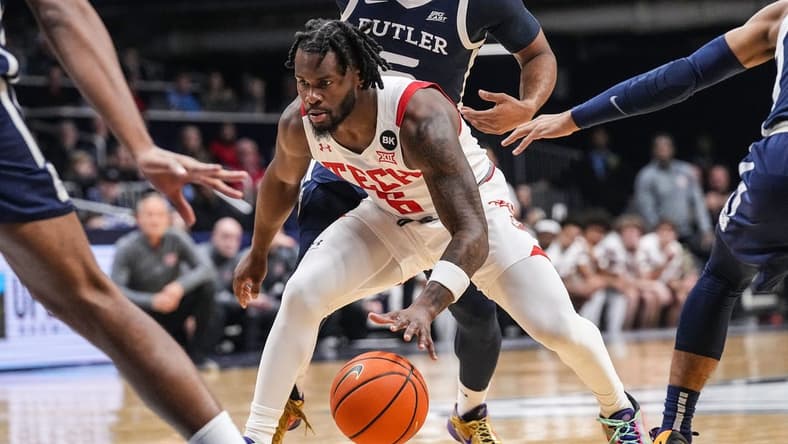 Texas Tech Red Raiders guard Joe Toussaint (6) moves up the court Thursday, Nov. 30, 2023, during the game against the Butler Bulldogs at Hinkle Fieldhouse in Indianapolis.