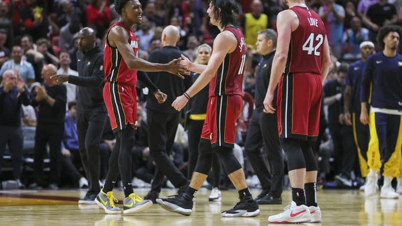 Nov 30, 2023; Miami, Florida, USA; Miami Heat guard Josh Richardson (0) celebrates with guard Jaime Jaquez Jr. (11) against the Indiana Pacers during the fourth quarter at Kaseya Center. Mandatory Credit: Sam Navarro-USA TODAY Sports