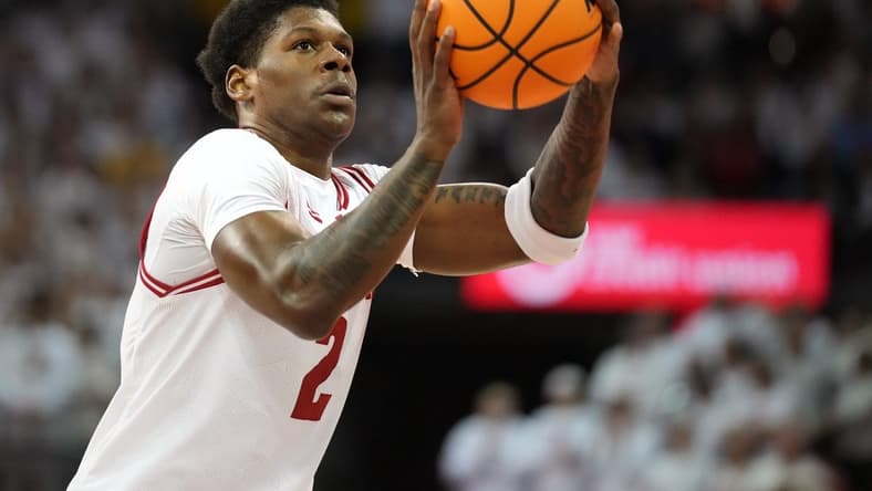 Dec 2, 2023; Madison, Wisconsin, USA; Wisconsin Badgers guard AJ Storr (2) shoots a free throw against the Marquette Golden Eagles during the second half at the Kohl Center. Mandatory Credit: Kayla Wolf-USA TODAY Sports