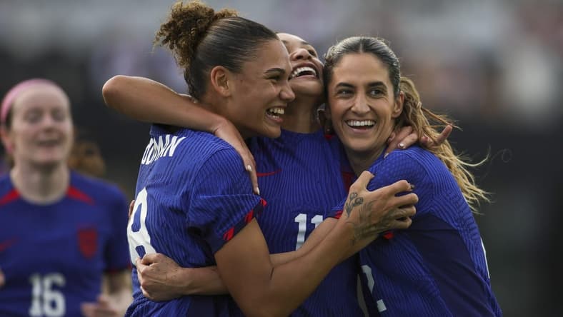 Dec 2, 2023; Fort Lauderdale, Florida, USA; United States forward Sophia Smith (11) celebrates with forward Trinity Rodman (8) and midfielder Savannah DeMelo (22) after scoring against China during the first half at DRV PNK Stadium. Mandatory Credit: Sam Navarro-USA TODAY Sports