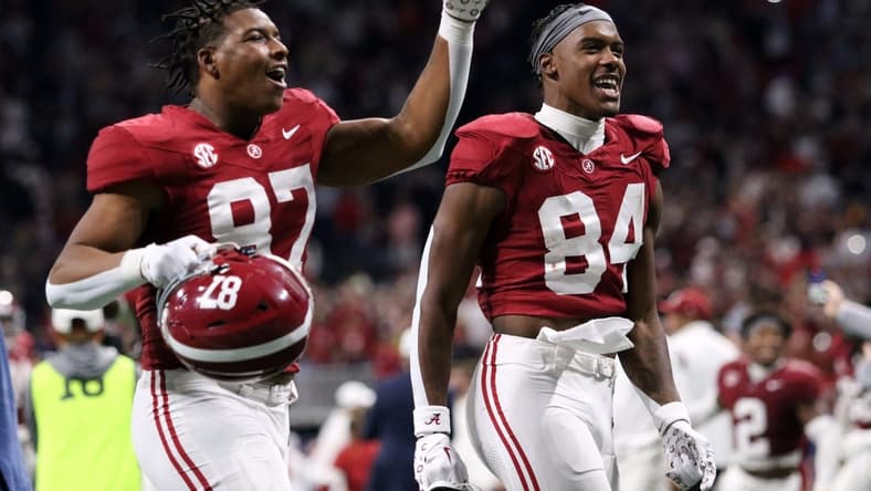 Dec 2, 2023; Atlanta, GA, USA; Alabama Crimson Tide tight end Amari Niblack (84) and tight end Danny Lewis Jr. (87) celebrate after defeating the Georgia Bulldogs in the SEC championship game at Mercedes-Benz Stadium. Mandatory Credit: Jordan Godfree-USA TODAY Sports