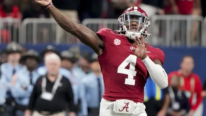 Dec 2, 2023; Atlanta, GA, USA; Alabama Crimson Tide quarterback Jalen Milroe (4) throws against Georgia at Mercedes-Benz Stadium. Milroe was named the MVP. Alabama defeated Georgia 27-24 to claim the SEC Championship. Mandatory Credit: Gary Cosby Jr.-USA TODAY Sports